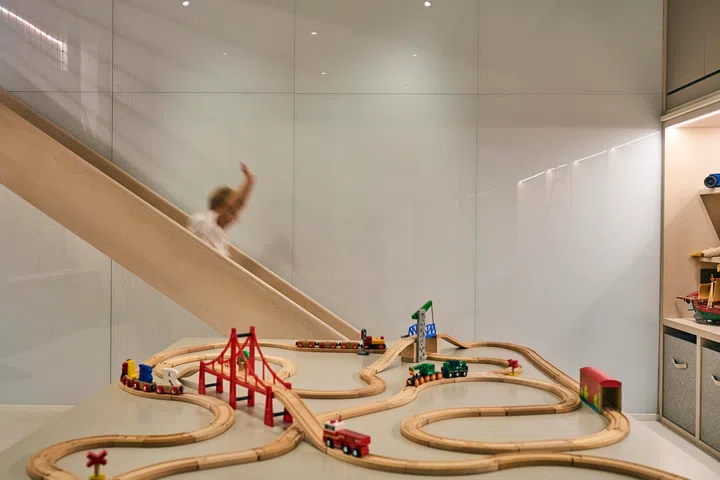 A custom-built slide injects  energy and fun into the children’s play space.