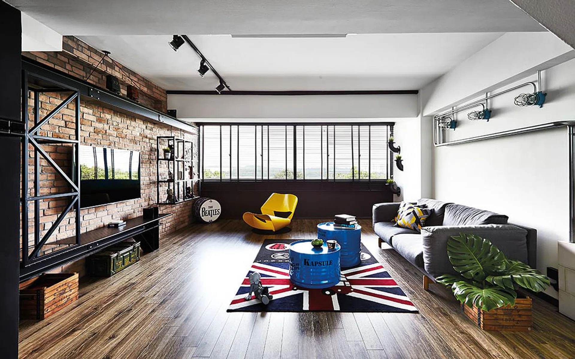 Furnishings in bright primary colours stand out in the open, airy ground floor.