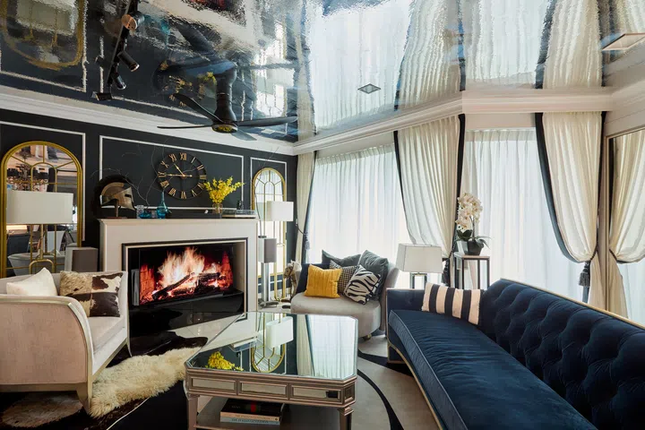 Maximalist interior design underscores the living room in this 5-room HDB DBSS flat in Ang Mo Kio.