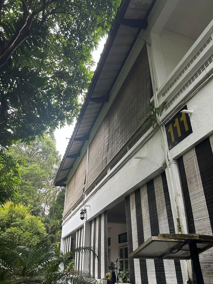 Close up look at the distinctive black and white outdoor blinds signature to colonial-era Singapore Land Authority (SLA) rental houses.