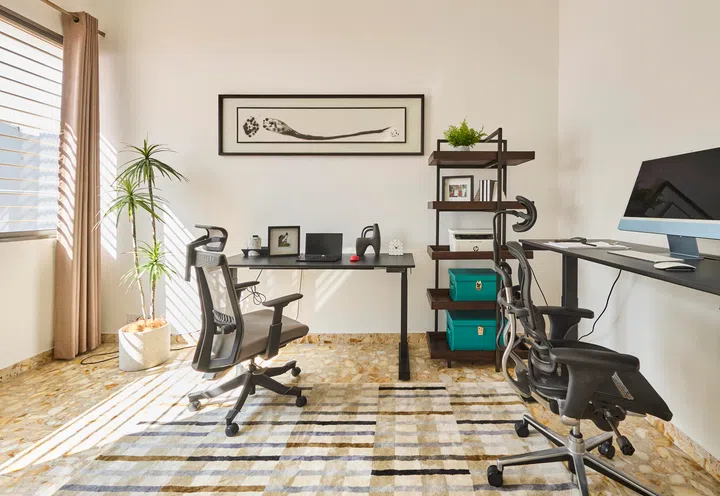 A study room flanked by bedrooms in the Liong household.