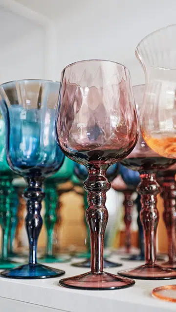 Assortment of colour wine glasses at Lovera Collections.