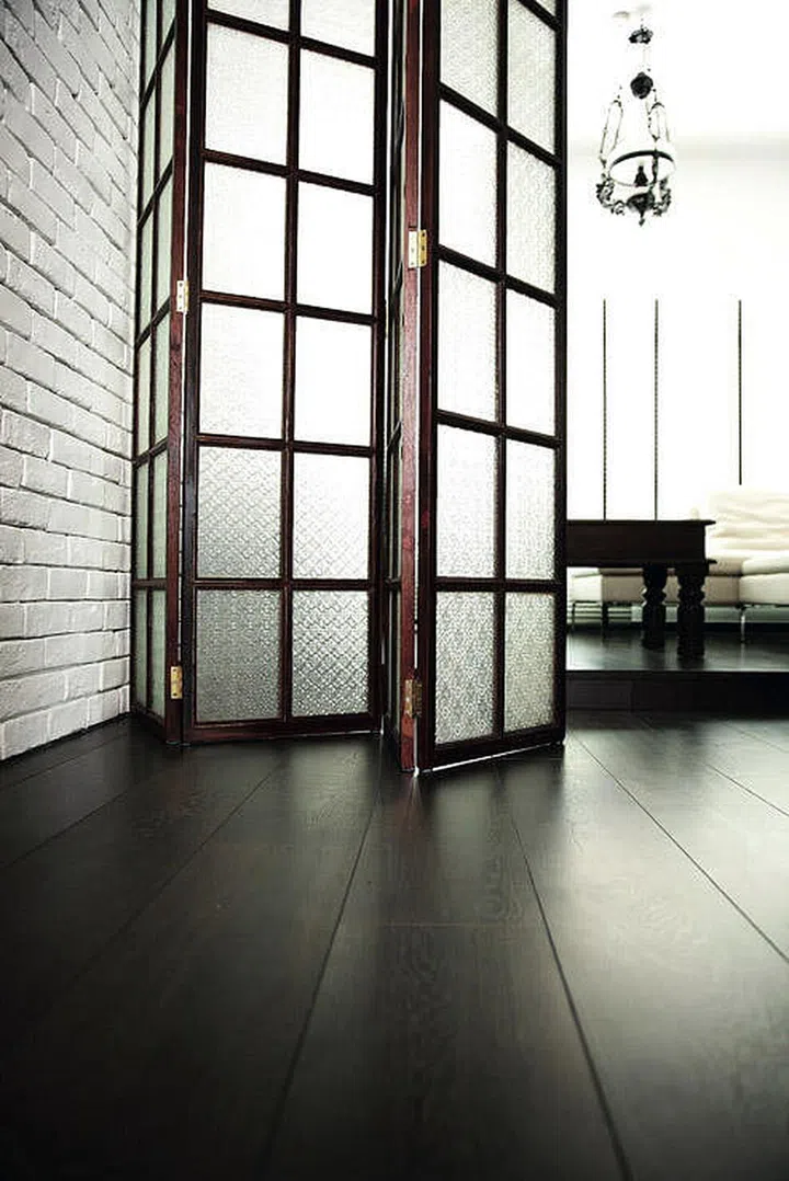 Another way to use an accordion door to zone your home and retain full privacy is with frosted glass (with wire mesh for a vintage accent). (Interior design by DistinctIdentity)