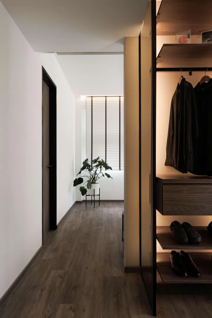 The existing wall between the master bedroom and the adjacent bedroom was hacked to create a walk-in wardrobe.