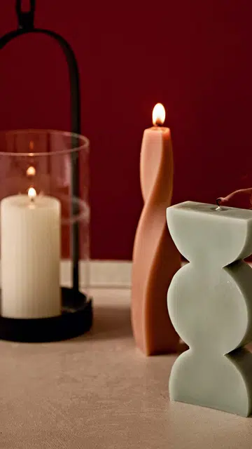 Green candle; Peach candle, all from Hooga.