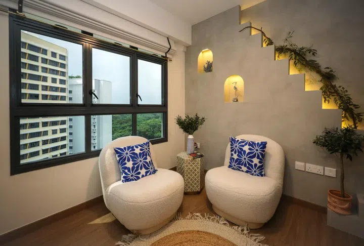 A corner of the flat offers a glimpse of the sea through the window.
