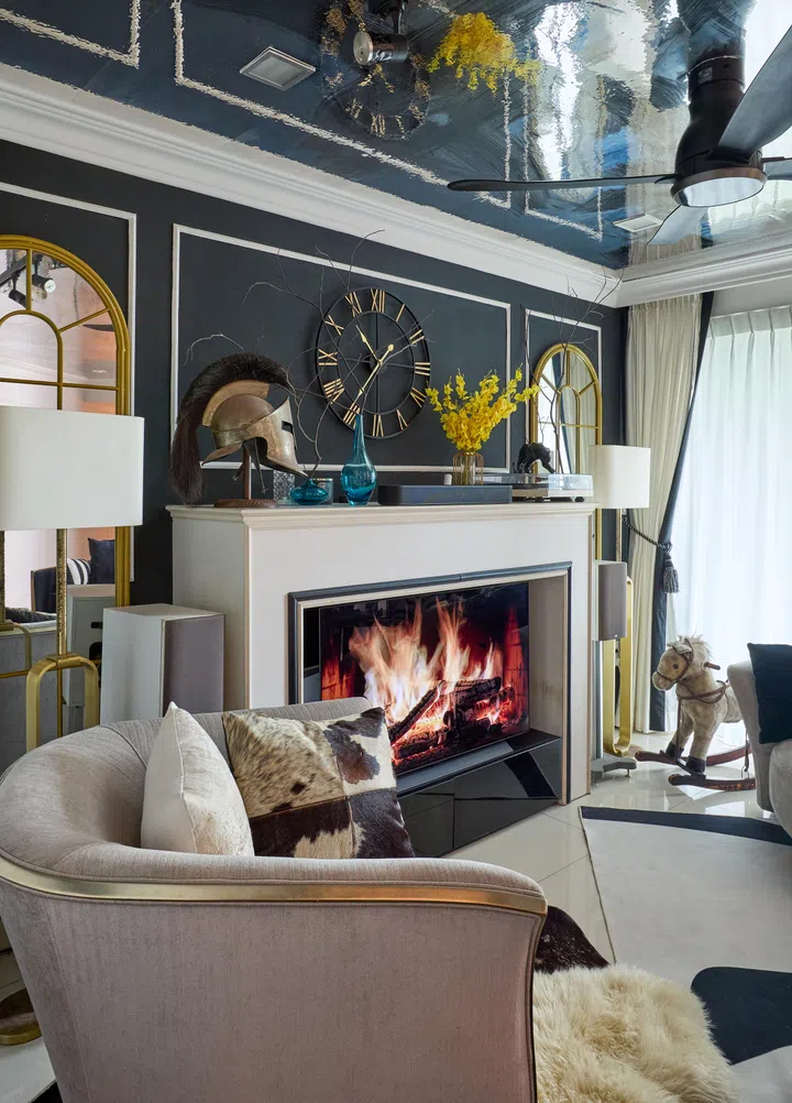 The TV feature wall has been disguised as a fireplace.