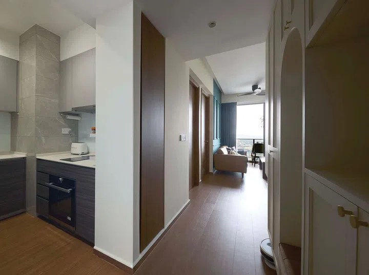 Walkway corridor in interior designer Vivian Chen (of Muwu Construction) and financial advisor husband, Michael Chan's 635 sq ft 2-bedroom condominium along Stirling Road.