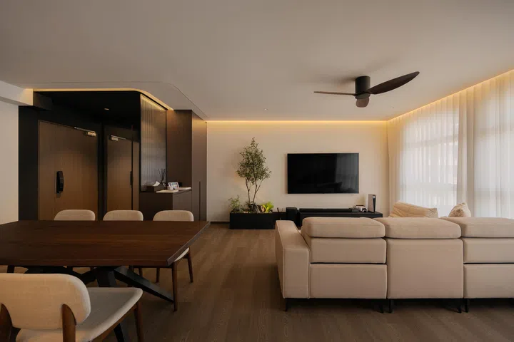 Living room in a 5-room HDB BTO at Tampines Street 96 (1,216 sq ft), designed by Inizio Atelier.