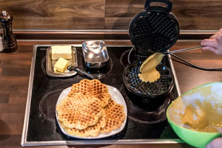 Baking Homemade waffles cooked in a waffle iron