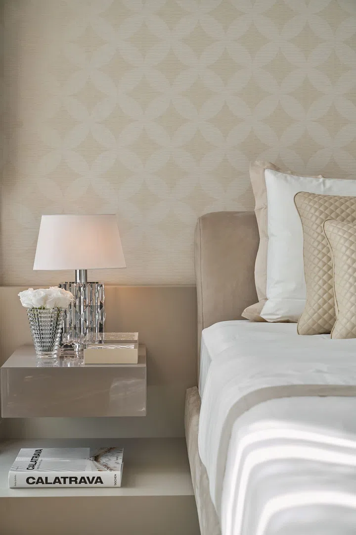 Crystalline details, neutral hues and subtle quilted patterns create a luxe atmosphere not unlike that of an upscale hotel accommodation.