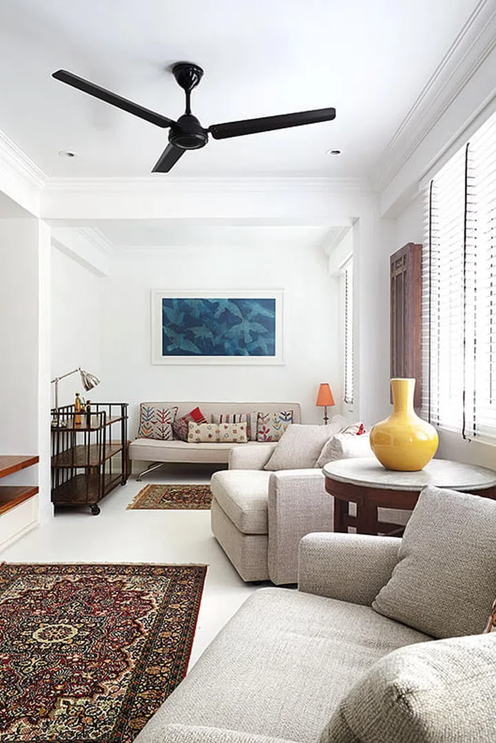 The second storey used to be taken up entirely by a master bedroom suite, but it’s now split up into a family room and a smaller bedroom for one child. The soothing mix of welcoming furniture and vibrant art and decor accessories was put together by the missus. “She has a really good eye for styling,” Alan remarks.