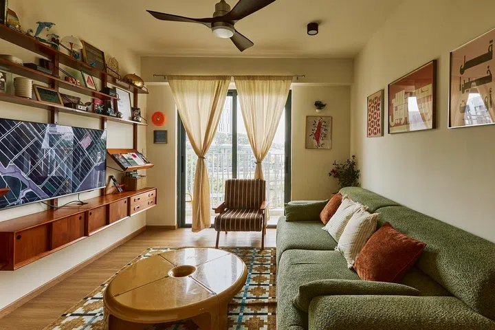 Warm, welcoming and layered with personality, the living room reflects Najiha and Iqbal’s shared love of vintage design, music and film.