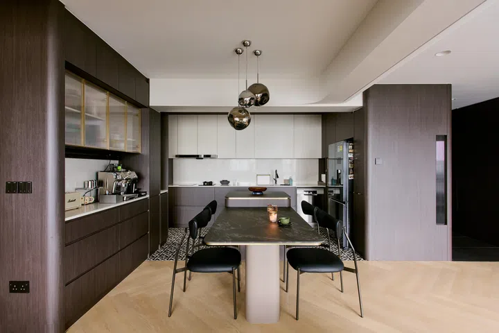 Dining area and kitchen in a 5-room HDB BTO in Woodlands.