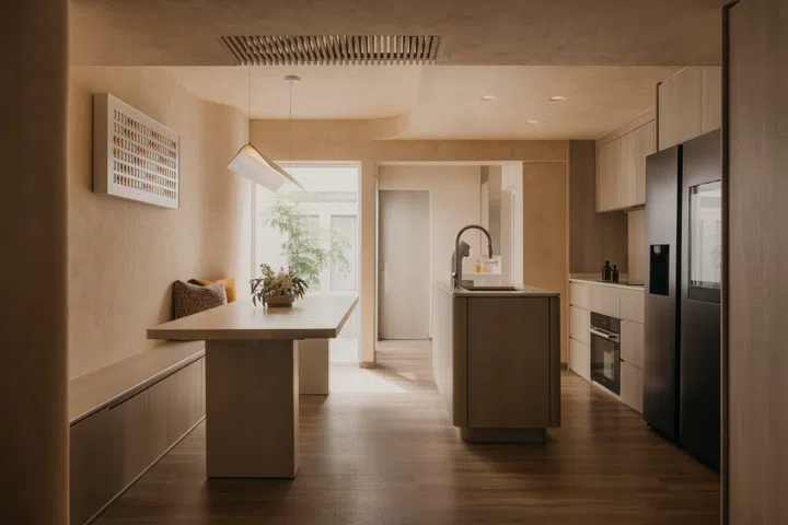 The kitchen and dining area are part of an open concept, with the airwell in front.