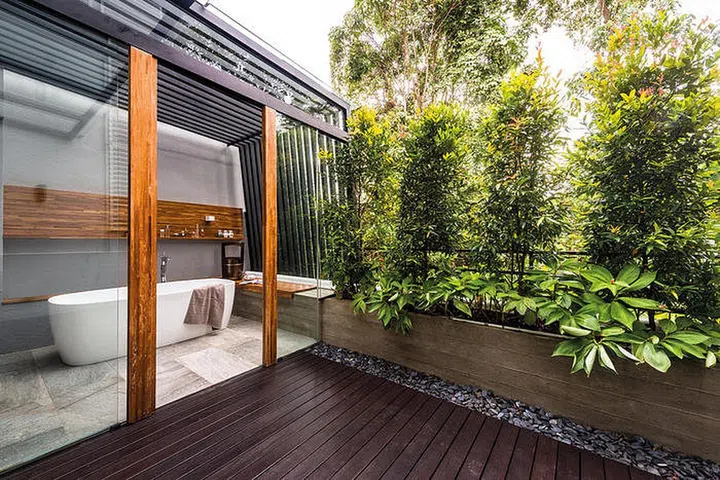There is a sense of liberation in the bath space, which overlooks the dense greenery of Bukit Timah Hill.