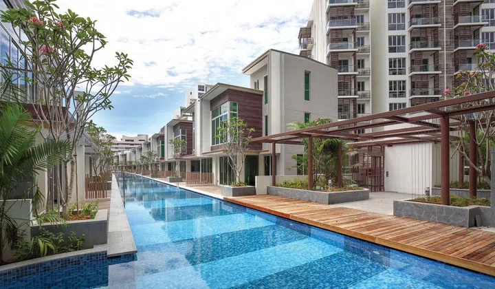 These townhouses are terrace-like structures that are apart of a larger condominium estate as seen at the back.