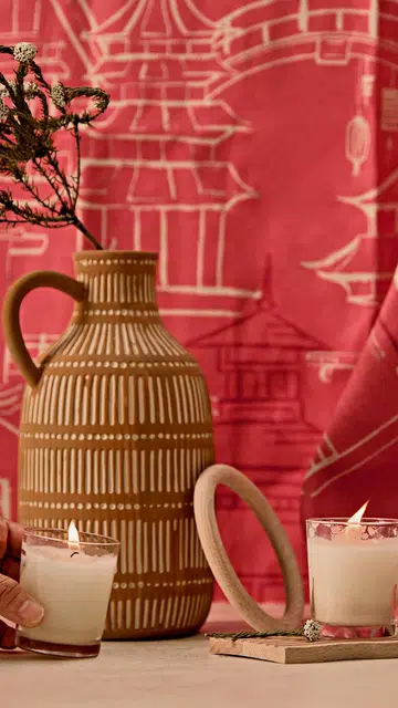 Vase, from SSF Home. Scented candle in glass, from Ikea.