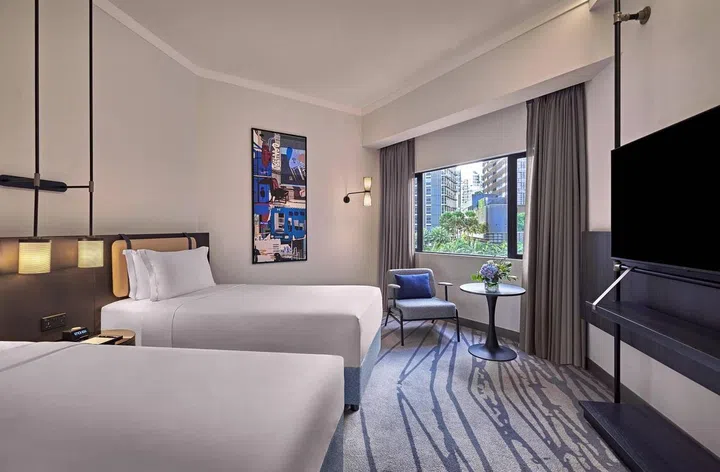 Pullman Hotel Singapore Orchard bedroom suite view