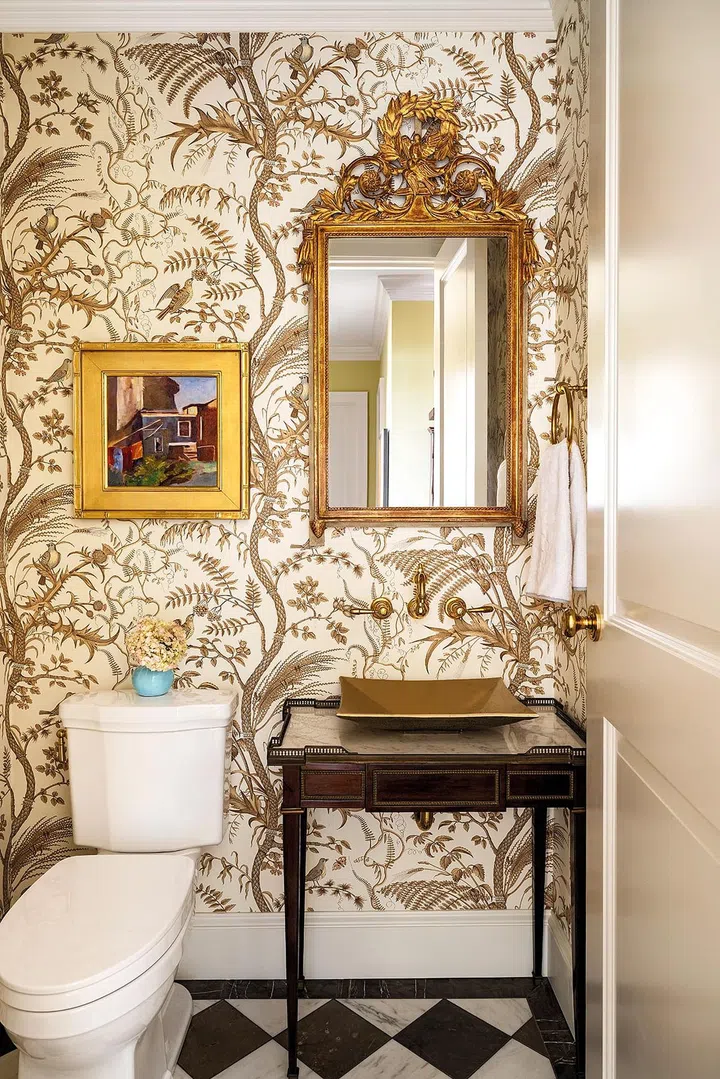 Wall Covering by Brunschwig and Fils. Faucet by Waterworks. Sink by Stone Forest. Marble floors by Materials Marketing.