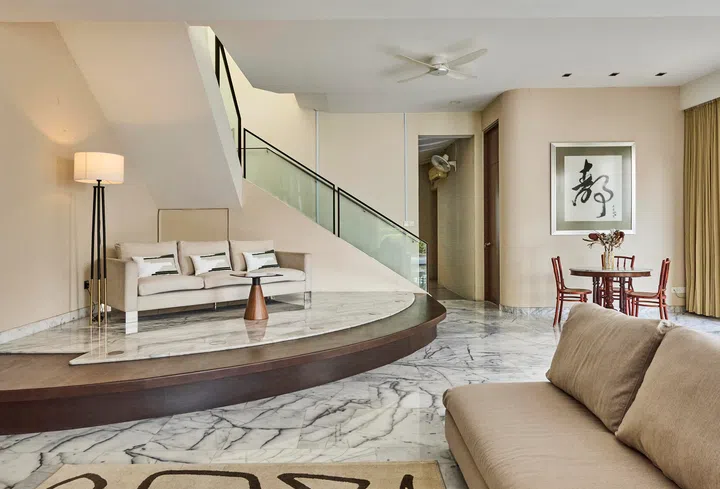 Raised platform 'stages' were a trendy interior design feature to have in homes in the early 2000s. Alec and his sister would perform for the family on stage at gatherings.