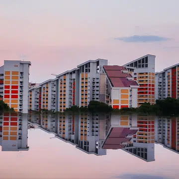 Mirror reflection of HDB blocks in Singapore.