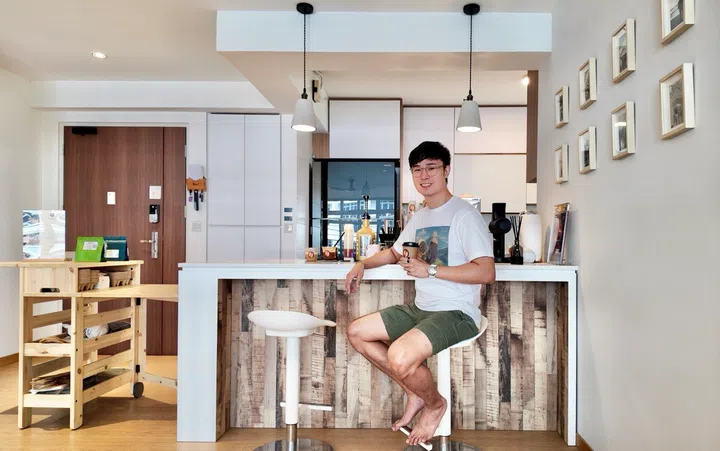 Mr Mark Chu, 35, who is the founder of home cafe Chuffee House and works in the social media industry, poses for a picture in his 5-room HDB in Tampines.