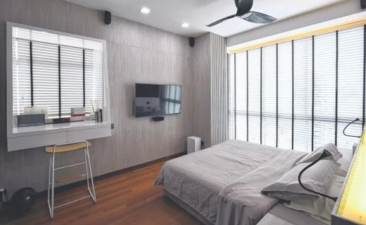 Master bedroom (above) in this Balestier 3-bedroom condominium.