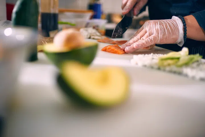 Chef making sushi.