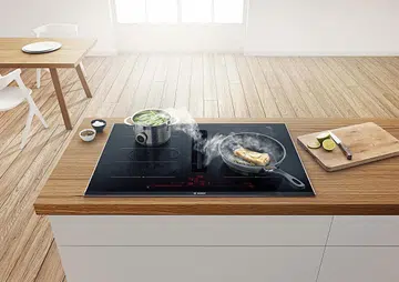 Enhance your culinary pursuits with Bosch’s Series 8 Induction Hob with an integrated ventilation system.