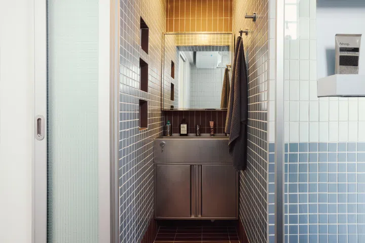 A hidden and cosy vanity was carved out of space from the adjacent kitchen.