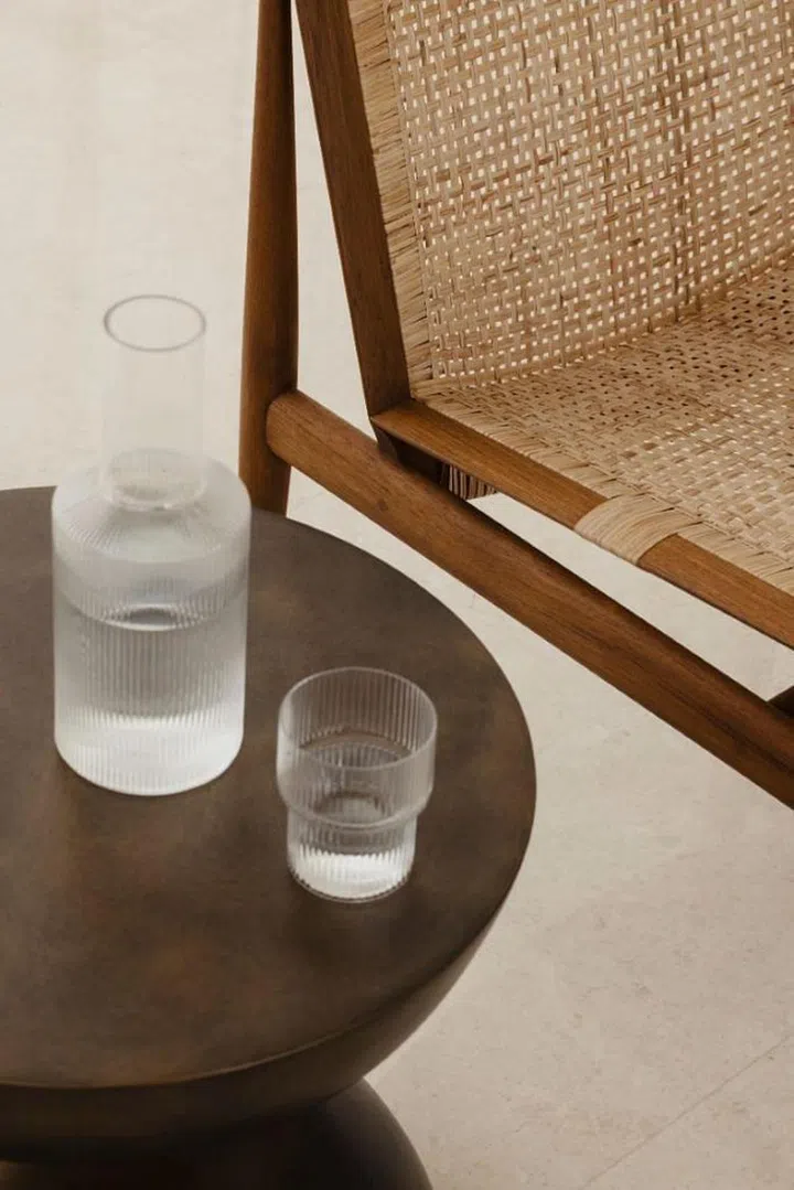 The lounge chairs from Phantom Hand’s Tangali collection introduces a craft aesthetic into the living area. (Photo: Studio Periphery)