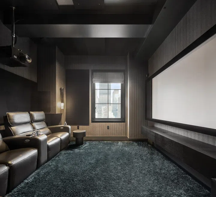 Upholstered walls in the theater room.