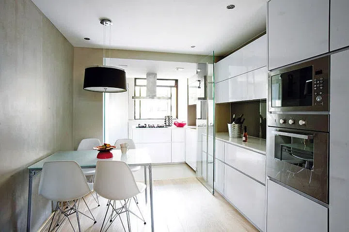 Hide the wet kitchen behind glass doors to prevent fumes from spreading through your home.