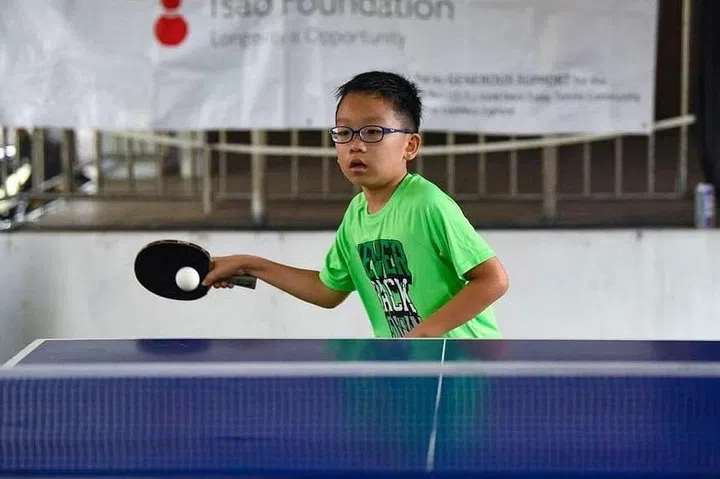 Primary 4 pupil Lim Sze Rui in action at Fa Ren’s second anniversary tournament at Block 3 Queen‘s Road on July 29. ST PHOTO: EUGENE TAN
