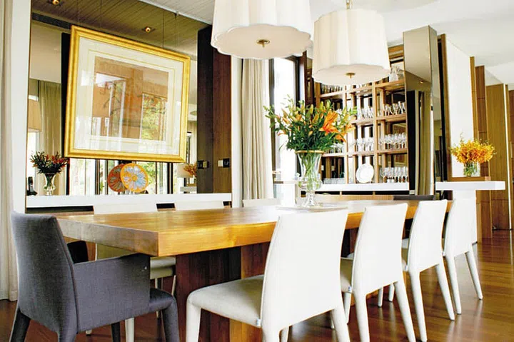 Changeable chair upholstery makes the formal-looking dining room kid-friendly. 