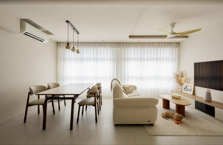 Walls were hacked to create flow and openness, with sheer curtains softening daylight throughout.