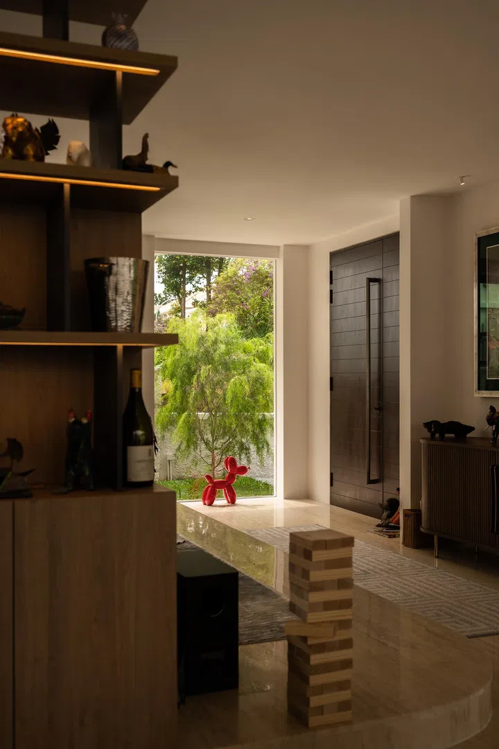 The floor-to-ceiling windows and original shutters on both floors.