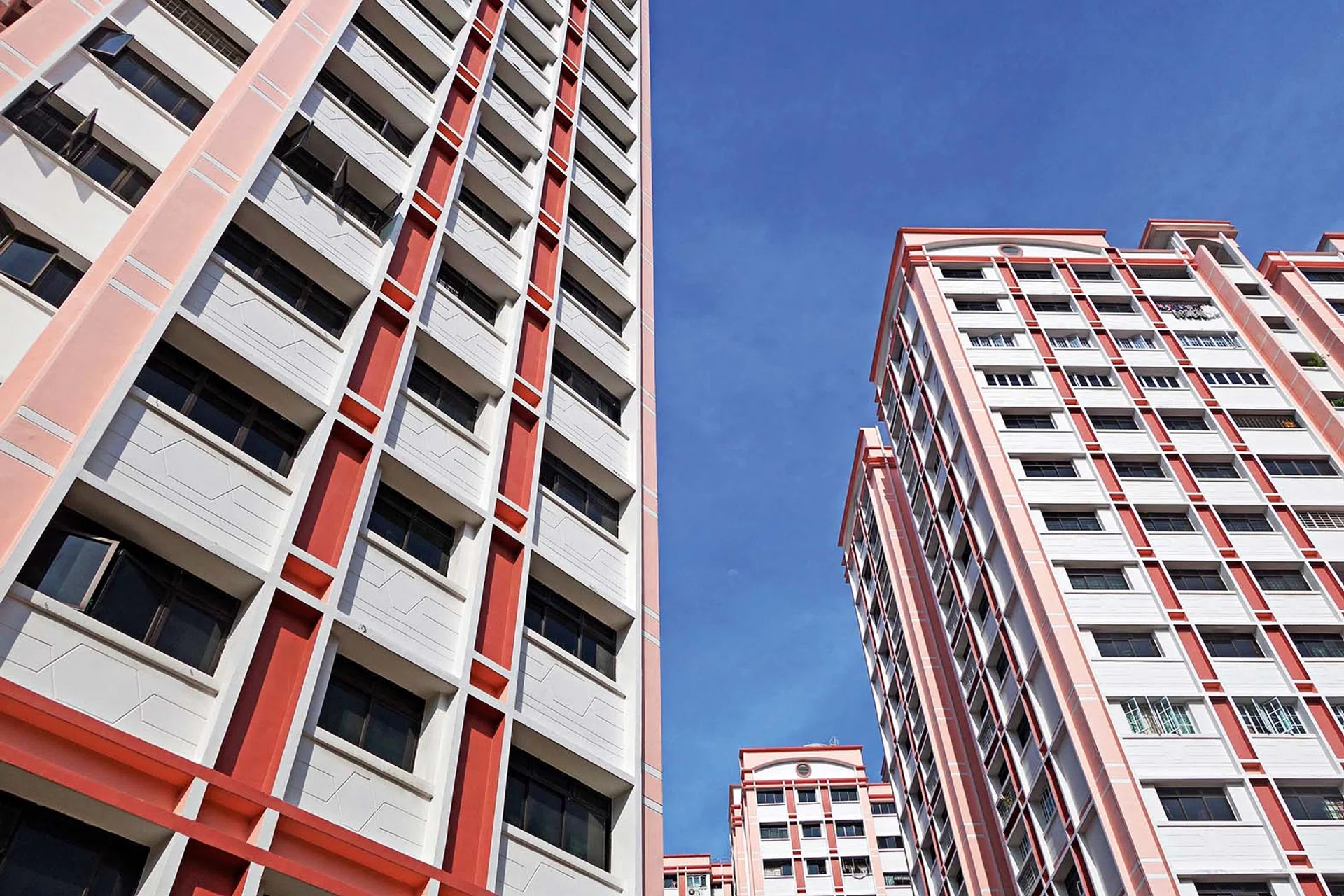Block of HDB Flats found in Singapore against blue sky