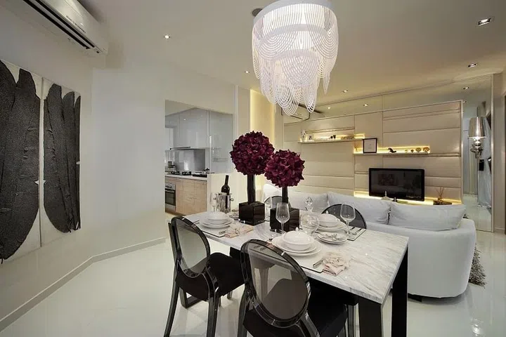 In this Eight Courtyards condominium apartment, a dining table with an elegant stone (especially marble) top perfectly complements plain white walls, too.