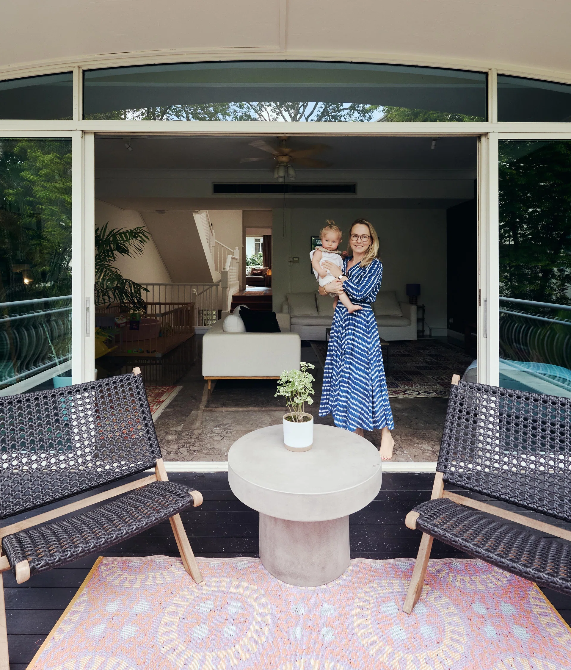 Pictured here is Dutch entrepreneur Lotte, founder of textile brand Annafilippa, and daughter. She lives in this rented 4-storey townhouse in Sommerville Park condo (4,101 sq ft) with her Swedish husband who works in shipping, their two young daughters, and their helper.