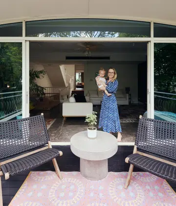 Pictured here is Dutch entrepreneur Lotte, founder of textile brand Annafilippa, and daughter. She lives in this rented 4-storey townhouse in Sommerville Park condo (4,101 sq ft) with her Swedish husband who works in shipping, their two young daughters, and their helper.