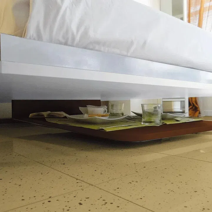 bed folded down but dining table remains level