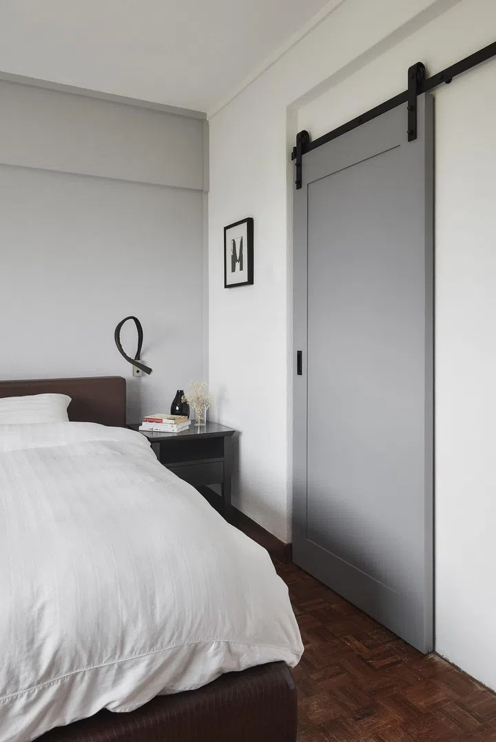 Master bedroom with parquet flooring in a 1,650 sq ft 3-bedroom Marine Parade condo.