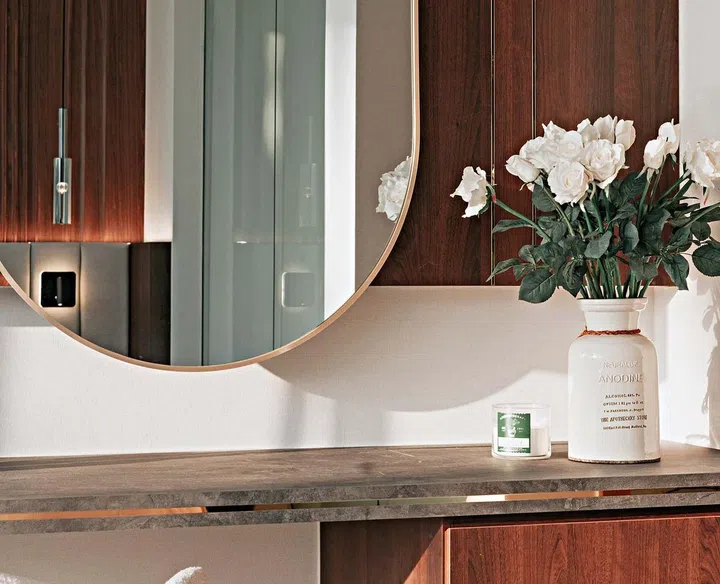 The metal inlay add texture and character to the vanity table.