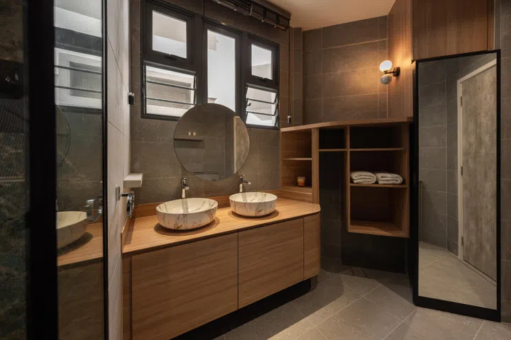 The master bathroom blends Japanese onsen references with retro window details, creating a more introspective, grounded space.