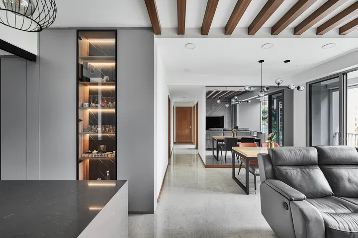 Living room within a 3 plus 1 bedroom apartment in Waterfront Key condominium along Bedok Reservoir Road.