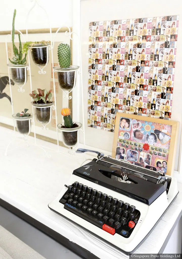 A typewriter and photographs are among the decorations in Ms Shi Xiao Wei and her husband Dickson Seow's home. 