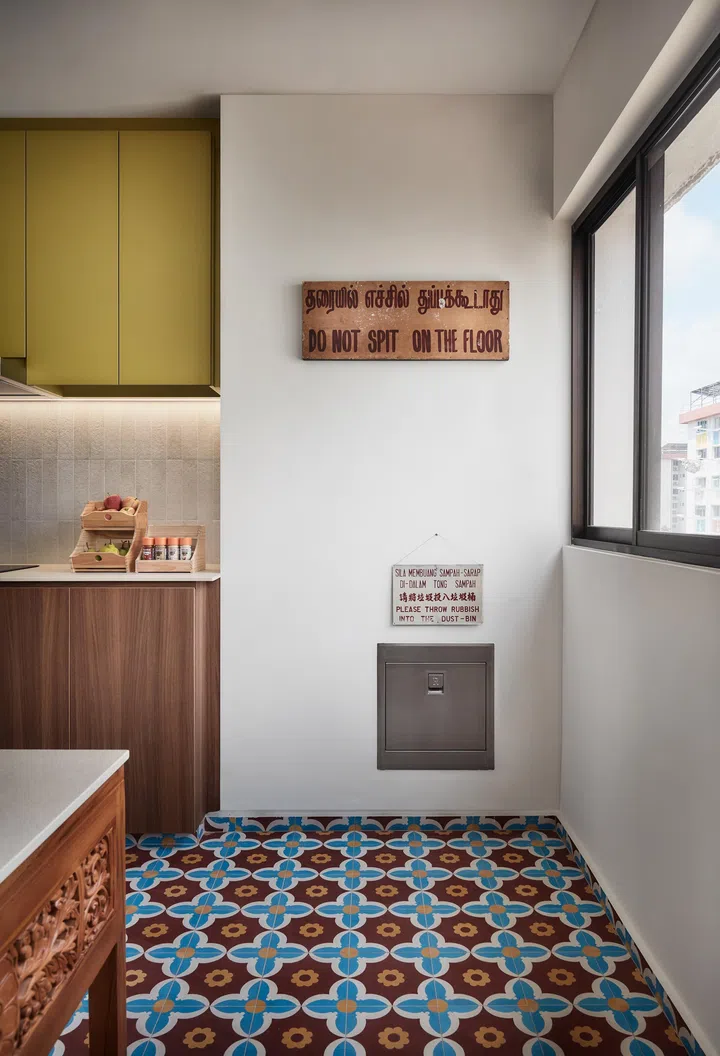 Patterned tiles and timber meet in close detail, reflecting a layered but intentional material palette.