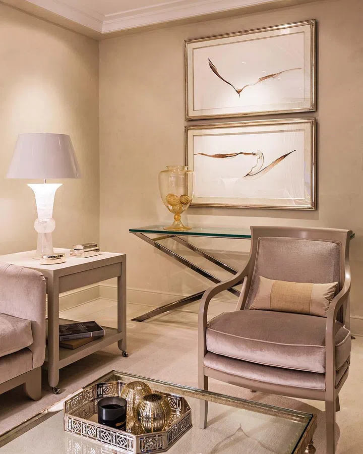 The interior design evokes a sense of glamour and sophistication set against a neutral colour palette.